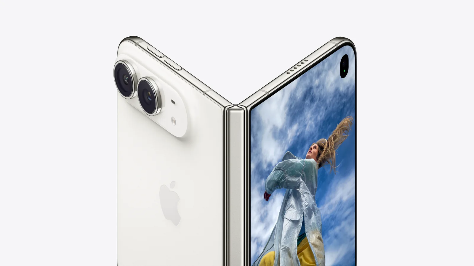 Close view of the titanium hinge and camera on a partially opened Star White iPhone Duo